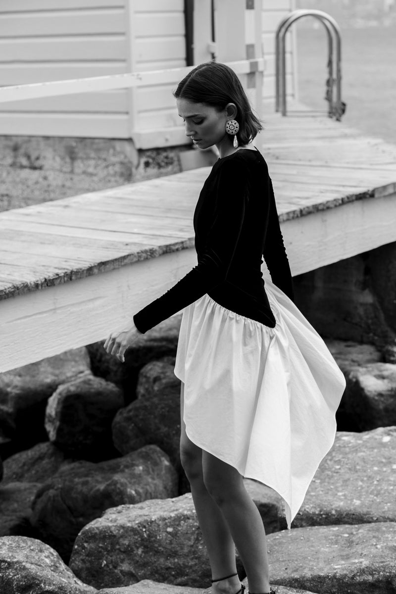 black dress with white ruffle VC Elegant Black Mini Dress with Peplum and White Ruffle Accents for Upscale Casual Gatherings